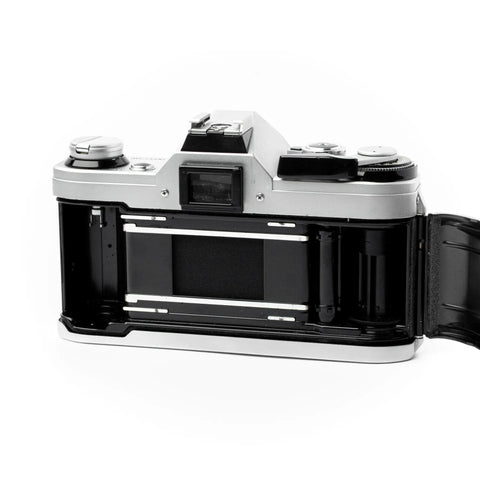 Canon AE-1 + FD 50mm 1.8 Canon